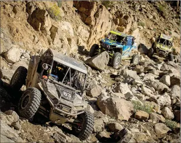  ?? Courtesy photo / Phil Henderson. ?? King of the Hammers is considered the toughest one-day off road race in the world. It is the largest off-road race event in North America in terms of both competitor­s and spectators. It combines desert racing and rock crawling, and has expanded from one race to a series of five races held throughout the week that take place each February on Blm-manged public lands in Johnson Valley.