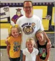  ?? SUBMITTED PHOTO ?? Watch DOG parent Tim Heurich posed last year with his three daughters, from left to right, Taylor, 9, Hailey, 6, and Madeline, 8, during the beginning of the 2015-16 school year. It was the first year the Watch DOGS program was held at Bradford Heights...