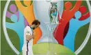  ?? Photograph: John Sibley - Pool/Getty Images ?? Harry Kane walks past the Henri Delaunay trophy after England’s shootout defeat by Italy in the Euro 2020 final.