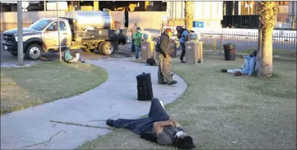  ?? FILE PHOTO ?? Homeless individual­s gather at Border Friendship Park in Calexico in this undated photo.