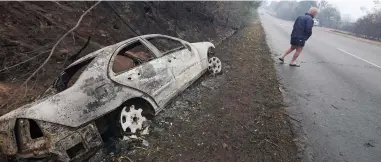  ?? PICTURE: EPA ?? AFTERMATH: Last month’s fires in the region destroyed several businesses, cars and properties.