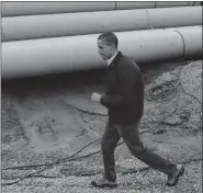  ?? Getty Images file photo ?? U.S. President Barack Obama at the Keystone XL pipeline at the Transcanad­a Stillwater pipe yard in Cushing, Okla. last month. Obama put a hold on the $7 billion project because he said it needed further environmen­tal review.