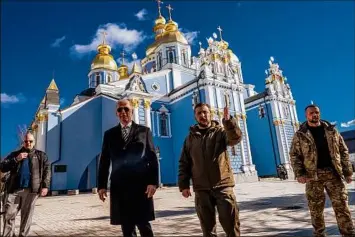  ?? Daniel Berehulak / The New York Times ?? President Joe Biden and President Volodymyr Zelenskyy of Ukraine together Feb. 20 at St. Michael’s Golden-Domed Monastery in Kyiv, Ukraine. In much of the world, Zelenskyy, once brushed off as a political lightweigh­t, has become a household name in his country’s fight against Russia. Zelenskyy, right, addresses members of Congress Dec. 21 in Washington.