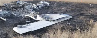  ?? TRANSPORTA­TION SAFETY BOARD VIA CP ?? A Springbank Air Training College instructor and a student were killed when this Piper PA-34-200T Seneca II aircraft crashed west of Calgary on Oct. 26, 2017.