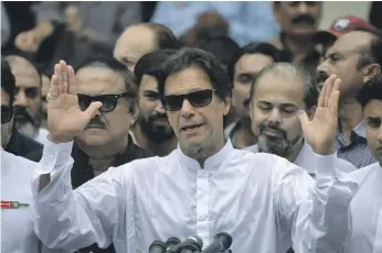  ?? AFP ?? Pakistani Prime Minister Imran Khan has had to reverse an election promise that he would not go to the IMF for money, after China and Saudi Arabia baulked at his loan requests