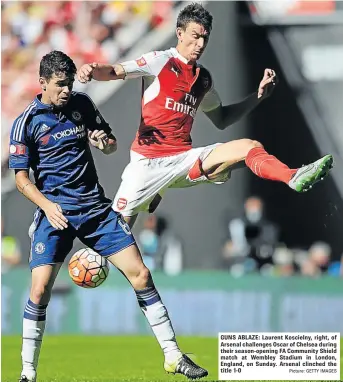  ?? Picture: GETTY IMAGES ?? GUNS ABLAZE: Laurent Koscielny, right, of Arsenal challenges Oscar of Chelsea during their season-opening FA Community Shield match at Wembley Stadium in London, England, on Sunday. Arsenal clinched the title 1-0