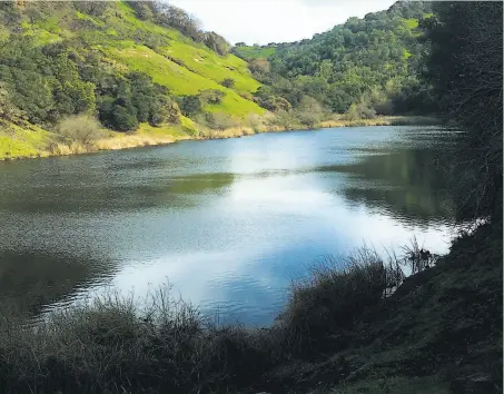  ?? Richard Degraffenr­eid / Special to The Chronicle ?? Lake Marie in Skyline Wilderness Park is tucked in a gorgeous valley near Napa. It’s a hike of 2.2 miles to get to the lake.