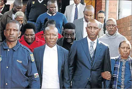  ?? / ANTONIO MUCHAVE ?? EFF leader Julius Malema with his lawyer Tumi Mokwena after Mokwena was granted R10 000 bail in the Thabamoopo Magistrate’s Court in Lebowakgom­o, yesterday.
