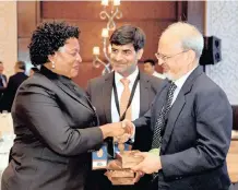  ?? JACOLINE SCHOONEES DNS ?? DEPUTY Minister of Internatio­nal Relations and Co-operation Reginah Mhaule with the president of the Observer Research Foundation, Samir Saran, centre, and Foreign Secretary Minister of External Affairs Vijay Gokhale. |