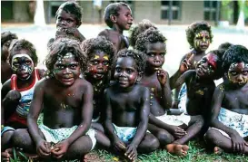  ??  ?? Wedding or baptism? Some of the children from the Tiwi Islands