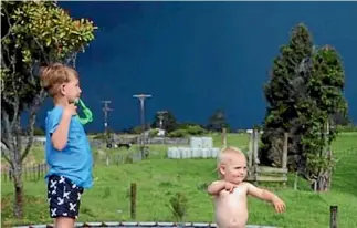  ?? BRIDGET BAIKIE ?? Before hailstones as big as golf balls pelted their North Taranaki home Issac Baikie, 6, and Tanner Baikie, 1, were in wonder of how black the sky was.