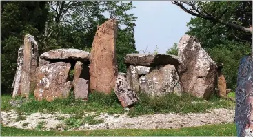  ??  ?? ANCIENT: The Neolithic monument now on land owned by James Corden and his wife Julia, right