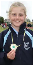  ??  ?? Chloe Murray (Ferns) won gold in the Under-9 long jump.