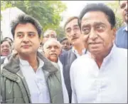  ?? PTI ?? Jyotiradit­ya Scindia (L) and Kamal Nath after meeting Governor Anandiben Patel at Raj Bhawan in Bhopal.