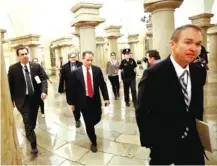  ?? THE ASSOCIATED PRESS ?? Office of Management and Budget Director Mick Mulvaney, right, White House Chief of Staff Reince Priebus, and White House chief strategist Steve Bannon, depart after a Republican caucus meeting on Capitol Hill on Thursday.