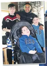  ??  ?? HAPPY EASTER: Wigan’s Willie Isa and team-mates paid a visit to the Derian House Children’s Hospice