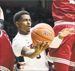  ?? Stephen Dunn / Associated Press ?? UConn’s Alterique Gilbert in action against Saint Joseph on Wednesday.