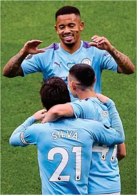  ?? PICTURE:.GETTY ?? Drought over:. Jesus.enjoys.his.goal.with.Silva.and.Foden.