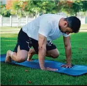  ??  ?? SIT-THROUGH EXTENSION
STEP 1 Begin in quad press position, spine parallel to the ground. Keep pressing into the earth with your hands.