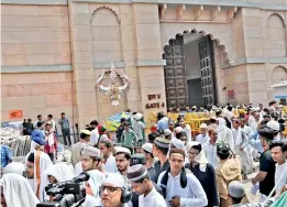  ?? — PTI ?? Muslims leave after offering the Friday prayers at the Gyanvapi Masjid in Varanasi. Security has been increased around the complex after a Varanasi court allowed the videograph­ic survey and ruled that the court commission­er has to submit a report by May 17.