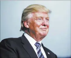  ?? EVAN VUCCI/THE ASSOCIATED PRESS ?? Republican presidenti­al candidate Donald Trump appears Friday during a campaign rally in Charlotte, N.C.