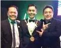  ??  ?? TRIO. Dr. Philip Anthony Larrazabal was earlier installed as president of the Cebu Doctors University. He is shown with Dr. Potenciano S. D. Larrazabal III and friend Dr. Troy Uy.