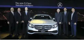  ??  ?? (L-R) With the new E-Class are Auto Nation Group, Inc. Chairman Greg T. Yu; Daimler South East Asia CEO Wolfgang Huppenbaue­r; Auto Nation Group, Inc. president Felix R. Ang; Alabang Auto Icon president Dexter G. Co.; CATS Motors, Inc. president Rene G. Nuñez; and Global Stars Motors Corp. president Edward Onglatco