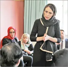  ??  ?? Ardern speaks to representa­tives of the Muslim community at Canterbury refugee centre in Christchur­ch.
