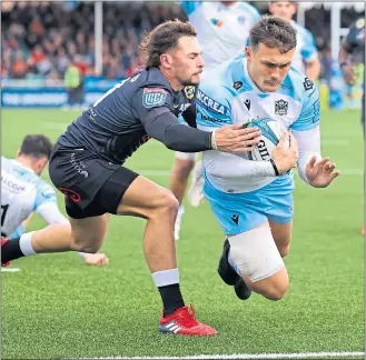 ?? ?? Cole Forbes goes over for Glasgow’s fourth try at Scotstoun yesterday