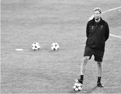  ??  ?? Liverpool’s German coach Jurgen Klopp attends a training session at Ramon Sanchez Pizjuan stadium in Sevilla on November 20, 2017 on the eve of the UEFA Champions League group E football match between Sevilla and Liverpool. - AFP photo