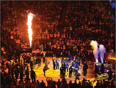  ?? JOSE CARLOS FAJARDO — STAFF PHOTOGRAPH­ER ?? The Warriors are introduced before the start of Game 1of the NBA Finals before a sellout crowd at Chase Center on Thursday night.
