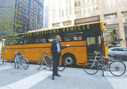  ?? POSTMEDIA NEWS FILES ?? GreenPower Motor Co. CEO Fraser Atkinson — with a Synapse 72 all-electric school bus behind him in 2017 — says one of the goals of the Biden administra­tion “is to convert all 500,000 school buses operating in the U.S. to zero emissions by 2030. That would be US$120 to US$140 billion.”