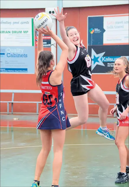  ??  ?? One to go: The Benalla Saints’ under-17s have won their way through to Sunday’s Goulburn Valley Netball League grand final with the help of Georgia Thomson’s defensive pressure. Picture: Jessica Ball