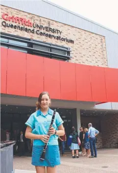  ??  ?? CHALLENGE: St Andrew's Catholic College student Evelyn Cox played clarinet at the Queensland Conservato­rium of Music.