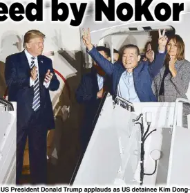  ?? AFP ?? US President Donald Trump applauds as US detainee Kim Dongchul gestures upon his return with fellow detainees Kim Hak-song and Tony Kim (behind), after they were freed by North Korea, in Maryland yesterday.