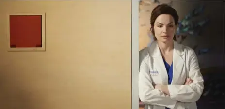  ?? BELL MEDIA ?? Erica Durance stars as Dr. Alex Reid in Saving Hope. “I feel like I won the lottery. I love acting and to do this for five years was a dream,” Durance said.