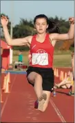  ??  ?? Sophie Kinsella taking to the air in the Long Jump competitio­n at our Summer Graded Series.