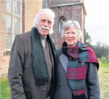  ??  ?? Pleased Graham Reid and Pam Mackenzie from the Blairgowri­e Players outside the Hill Kirk