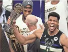  ?? DANIEL/GETTY IMAGES ?? Giannis Antetokoun­mpo and the Bucks will have a tough road on their way to a possible NBA title repeat. JONATHAN