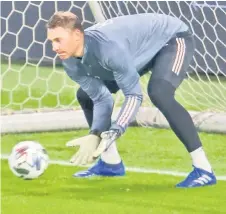  ?? — AFP Photo ?? Neuer saves a ball during a training session in Leipzig.