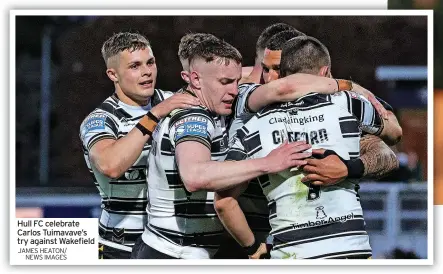  ?? JAMES HEATON/ NEWS IMAGES ?? Hull FC celebrate Carlos Tuimavave’s try against Wakefield