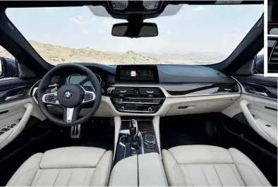  ??  ?? INSIDE LOOK The interior shows a seamless design where leather and polished veneer effectivel­y conceal the car’s vast array of technology