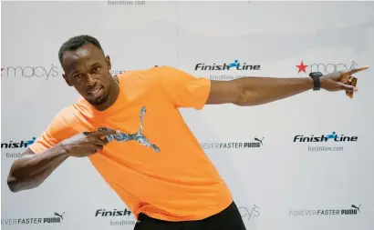  ?? — Reuters ?? Olympic champion Usain Bolt poses during a visit at Macy’s Herald Square in New York on Thursday.