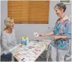  ??  ?? Card maker Margaret Buchanan and line dancer Helen Sharpels.