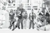  ?? MARK WALLHEISER/AP ?? Florida State quarterbac­k Deondre Francois scrambles during the Seminoles' win over Boston College Saturday at Doak Campbell Stadium.