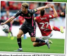  ?? GETTY IMAGES ?? Battler: Bamford shrugs off City’s Kalas