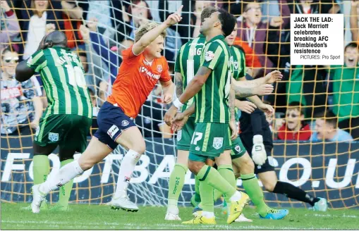  ?? PICTURES: Pro Sport ?? JACK THE LAD: Jack Marriott celebrates breaking AFC Wimbledon’s resistence