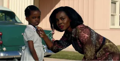  ??  ?? Them features an exceptiona­l breakout performanc­e from British-born actor Deborah Ayorinde (pictured with young Melody Hurd who plays her daughter Gracie Jane) as the tormented, but determined Livia.