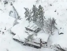  ?? AP ?? The Hotel Rigopiano in Farindola, Italy, was buried by an avalanche after a series of earthquake­s in the region Wednesday.