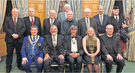  ?? ?? Main players Top table guests and committee members before the supper. Front row: Martin Cassidy, Ken Dow, David Sibbald, Councillor Rosemary Fraser, Rev. Gary J Mcintyre